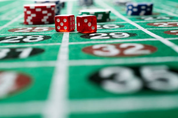 Live dealers at blackjack table during game session